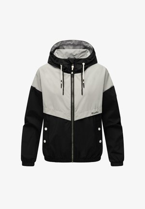 Melnā un pelēkā krāsā kapuces jaka ar rāvējslēdzēja priekšpusi, elastīgām piedurknēm un kontrastējoša krāsu bloku dizainu. Iespējami balti pogas un aukliņas.