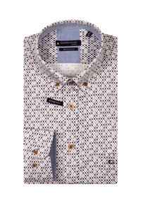 Chemise col en crème avec un motif à pois circulaires en bleu et marron. Dispose de détails de bouton et d'une étiquette extensible sur la poitrine. Coupe régulière.