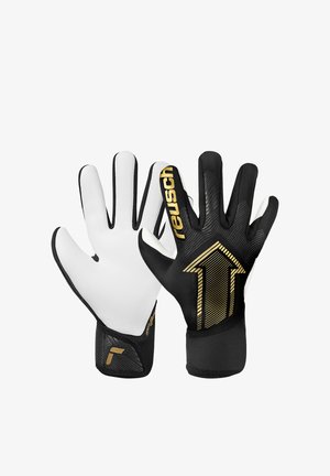 Torwarthandschuhe mit schwarz-weißem Design, goldenem Pfeil-Grafik auf dem Rückhandbereich und dem Markennamen "reusch" auf dem Zeigefinger.