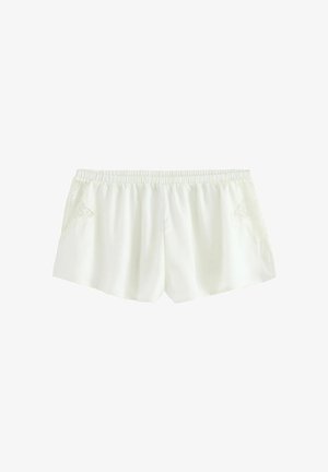 Pantaloni corti bianchi realizzati in un tessuto morbido e liscio, con una vita elasticizzata e delicati dettagli in pizzo su ciascun lato.