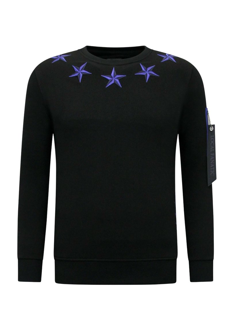 Zwarte sweatshirt met geborduurde paarse sterren langs de halslijn, geribbelde boorden en zoom, met een ritsaccent op de linkermouw.