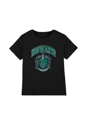 Black T-shirt with green "Hogwarts" text above a detailed Slytherin house crest featuring a serpent and ornate decorations.