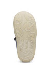 Semelle de chaussure en caoutchouc beige clair avec un motif en relief d'un logo circulaire et le nom de la marque "Natuurlike."