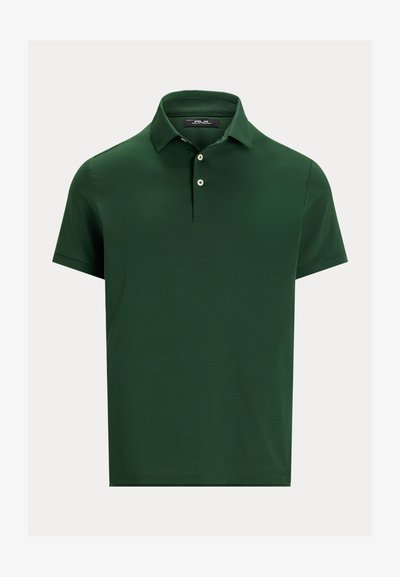 Temno zelena polo majica s kratkimi rokavi, z dvema gumboma in ovratnikom, prikazana na enobarvni svetli podlagi.