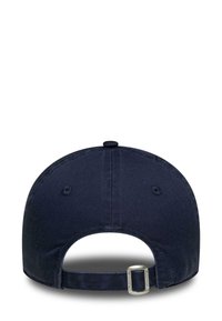 Dark navy baseball cap with a curved brim and fabric strap at the back. Features a metal adjustment buckle and breathable eyelets.