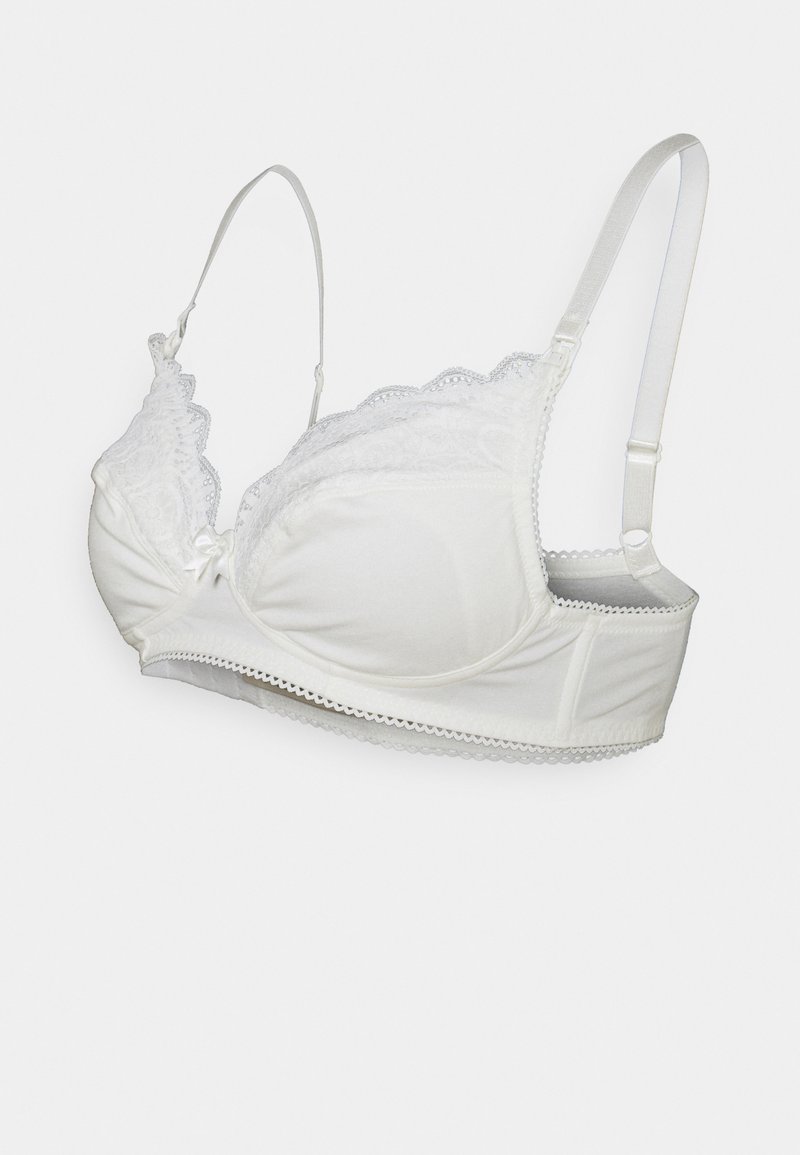 Sutiã branco com acabamento de rendas, copas com aro, alças ajustáveis e tecido suave. Apresenta um detalhe de laço no centro.