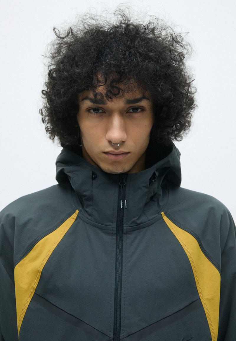 Nike Sportswear TECH PRO JACKET Giacca leggera anthracite