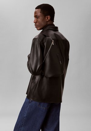 Calvin Klein, RAISED SLING - Olkalaukku - black
