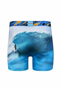 Short de bain bleu avec un grand motif de vague et de surfeur. Taille élastique avec un motif zigzag coloré et une étiquette logo à l'avant.