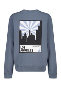 Sudaderas azules con un gráfico de un horizonte urbano y rayos, con "LOS ÁNGELES" y "LA CIUDAD DE LOS ÁNGELES" impresos debajo.