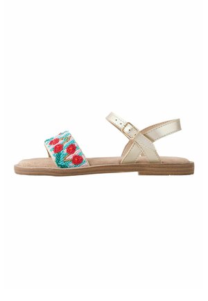 Flad beige sandal med justerbar ankelrem og bred frontrem dekoreret med flerfarvet blomsterperlearbejde.