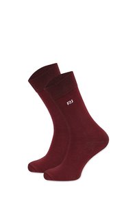 Bordowe skarpetki załogowe z prążkowanymi mankietami, miękką fakturą i wzmocnionym palcem. Posiadają subtelne białe logo blisko mankietu.