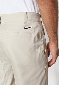 Nike Golf Tygbyxor - off-white