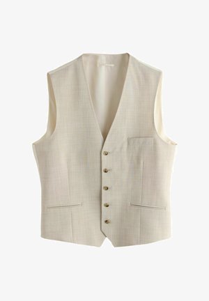 Bézs színű, férfi szabott mellény öt gombbal, két alsó paszpólos zsebbel, egy mellkasi paszpólos zsebbel és V-alakú nyakkal, laposan elhelyezve.