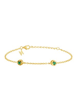 Gold chain bracelet featuring two green gemstone accents, delicate design with lobster clasp closure and long oval links.