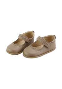 Zapatos Mary Jane de piel color beige con detalles perforados, correa ajustable, punta redonda y forro interior suave, con suela duradera.