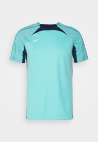 Camiseta de manga corta de Nike en color azul verdoso con acentos azules y un dise�ño de hombros texturizado y con patrón, que presenta un cuello redondo y aberturas laterales para mayor comodidad.