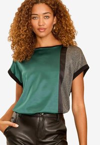 Unselected, teal and silver satin front