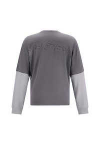 Long-sleeve t-shirt featuring a gray body and contrasting light gray sleeves, with embossed "Ed Hardy" text on the back. Soft texture.