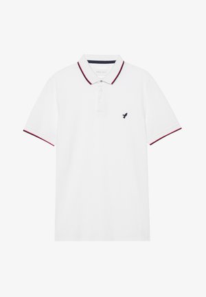 Valge polo särk kolme nööbiga, tume sinise ja punase servaga krae ning väikese tumesinise linnukujundiga rinna peal. Puuvillane materjal.