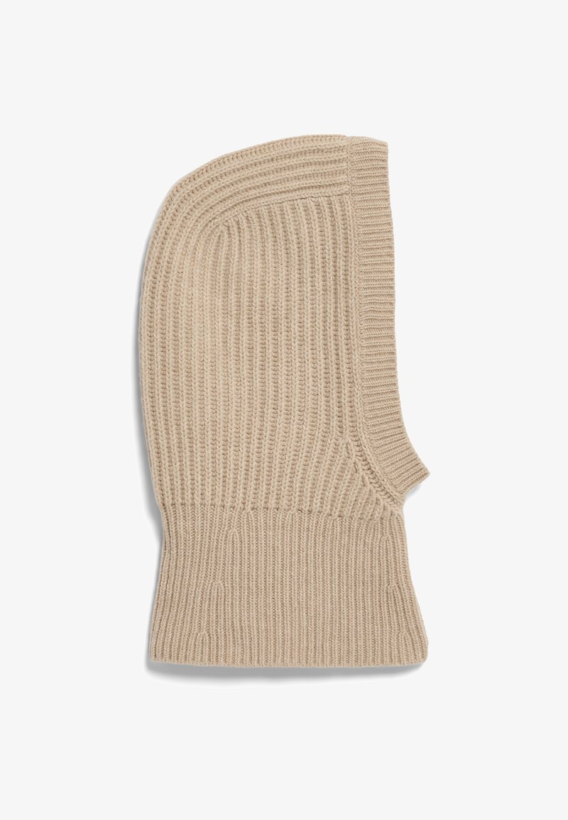 Beige pletená rukavice s žebrovanou texturou, prodloužený design a těsný, přiléhavý manžeta; žádné viditelné kovové prvky nebo vzory.