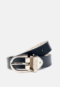 Navy leather belt with a shiny silver buckle and a distinctive geometric shape. Interior features a subtle patterned lining.