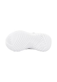 Suela de zapato de goma blanca con patrones texturizados, que presenta ranuras y crestas para mayor agarre, y un logotipo circular en relieve en un lado.