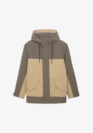Veste pour homme en beige et vert olive, avec une capuche, des boutons-pression, deux poches avant et un design en blocs de couleur. Fabriquée en tissu texturé.