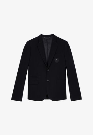 Sort skræddersyet blazer lavet af glat stof, med satin-spids lapel, to foranliggende lommer og en dekorativ lapel på venstre bryst.
