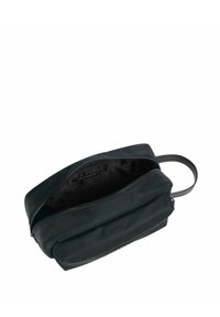 Borsa da toeletta nera con zip, dal design liscio, dotata di una maniglia laterale e un interno foderato con un motivo a logo ripetuto.