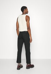 MCM COLLECTION PANTS - Vaqueros rectos - black