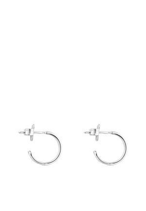 Orecchini a cerchio in argento dal design minimalista, caratterizzati da una forma arrotondata e una chiusura a perno sicura. Superficie liscia e lucidata.