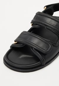 sandro Sandals noir/black Zalando