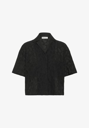 Schwarzes kurzärmliges Hemd mit einem strukturierten geometrischen Spitzenmuster, einem eingeschnittenen Kragen und einer lockeren Passform, die die Atmungsaktivität verbessert.