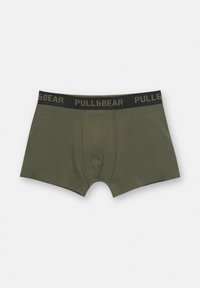 Olivově zelené boxerky s černým elastickým pasem, na kterém je logo "PULL&BEAR". Hladká textura, dobře padnoucí design a středně vysoký střih.