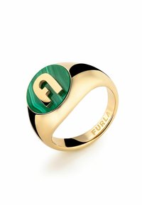 Arany árnyalatú gyűrű, malachit betéttel, melyen kiemelkedő "F" logó található. Simán ívelt sáv fekete akcentussal. Be van vésve: "Furla."