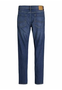 Denim jeans in dark blue with a straight fit. Features include two rear pockets with stitching detail and a tan leather brand patch on the waist.
