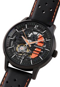 Orologio skeleton da uomo con cassa nera e cinturino in pelle. Presenta accenti arancioni, meccanismi metallici visibili e chiari indicatori per le ore.