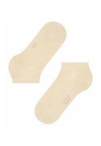 Beżowe skarpetki do kostek o gładkiej fakturze, z prążkowanym mankietem i nadrukowaną nazwą marki. Prosty design odpowiedni do codziennego noszenia.