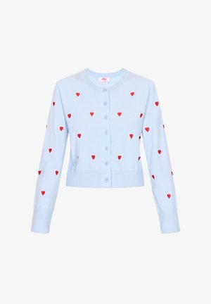 Heled sinine kardigan pikade varrukatega, nööpidega esiosas ja punaste südame mustritega. Omab ribadega mansette ja ääreosa. Valmistatud pehmest kudumist.