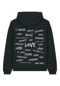 Black hoodie featuring various translations of "love" in white text; includes diverse fonts and sizes against a solid background.