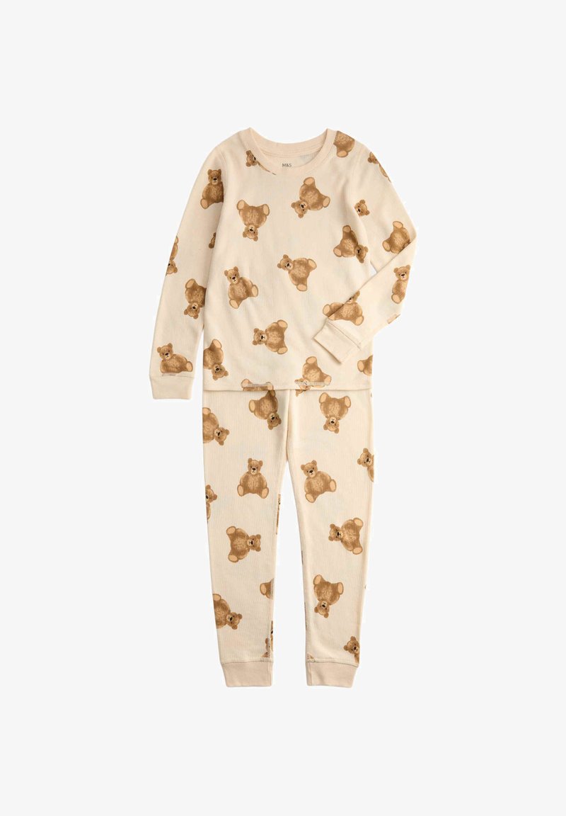 Børnepyjamas sæt med bjørnemønster i blødt, cremefarvet stof. Langærmede med ribkant og stramme bukser. Har gentagne design af teddy-bjørne.