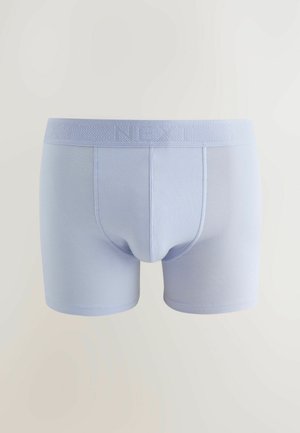 Helleblaue Boxershorts mit einem strukturierten Gummibund, der das Logo "NEXT" trägt. Hergestellt aus glattem Material, das für Komfort und eine körpernahe Passform sorgt.