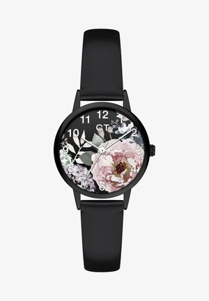 Montre ronde noire avec un cadran à motif floral, présentant des fleurs roses et violettes. Bracelet en cuir noir à finition texturée.