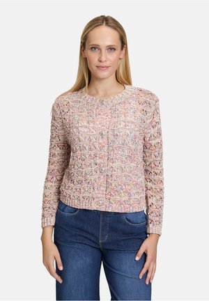 Gilet en tricot dans des couleurs pastel avec un design en texture et en tissage ouvert, encolure ronde et fermeture à boutons. Manches courtes et ajustées.