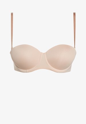 Nøgen stropløs bh med glatte skåle og bøjler, med justerbare stropper. Fremstillet af et blødt, strækbart stof med et sømløst design.