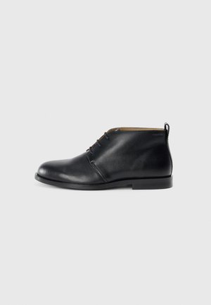 Nauhalliset nilkkurit - triple black