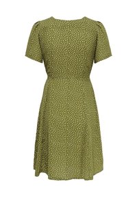 Robe longueur genou couleur vert olive avec manches courtes et petit motif de points blancs en forme de cœur.