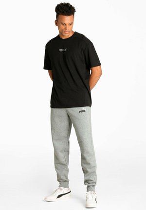 Puma Pantalones deportivos - grigio