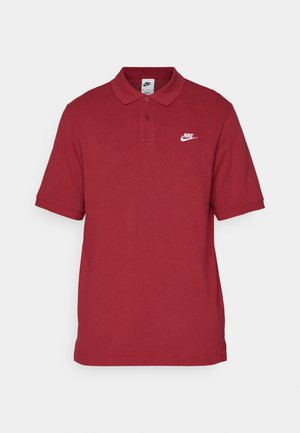 Maroon polo shirt made of cotton, featuring a collared neckline and three buttons, with a white Nike logo on the left chest.